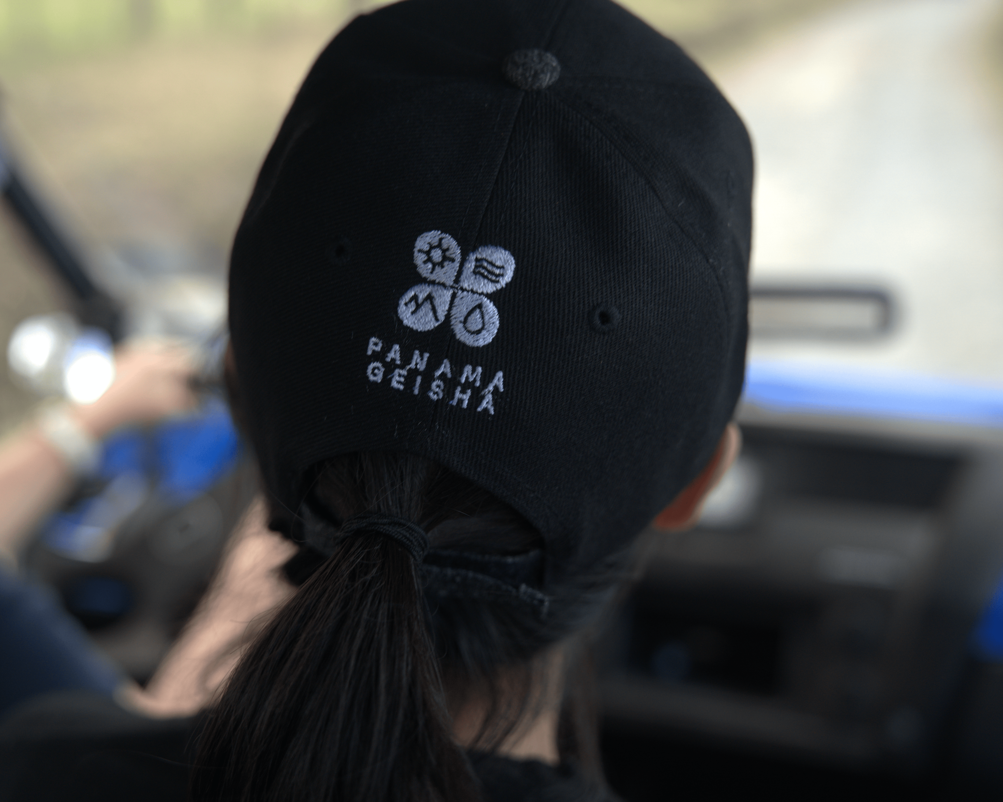 The back of Jiyoon's baseball cap, reads "Panama Geisha"