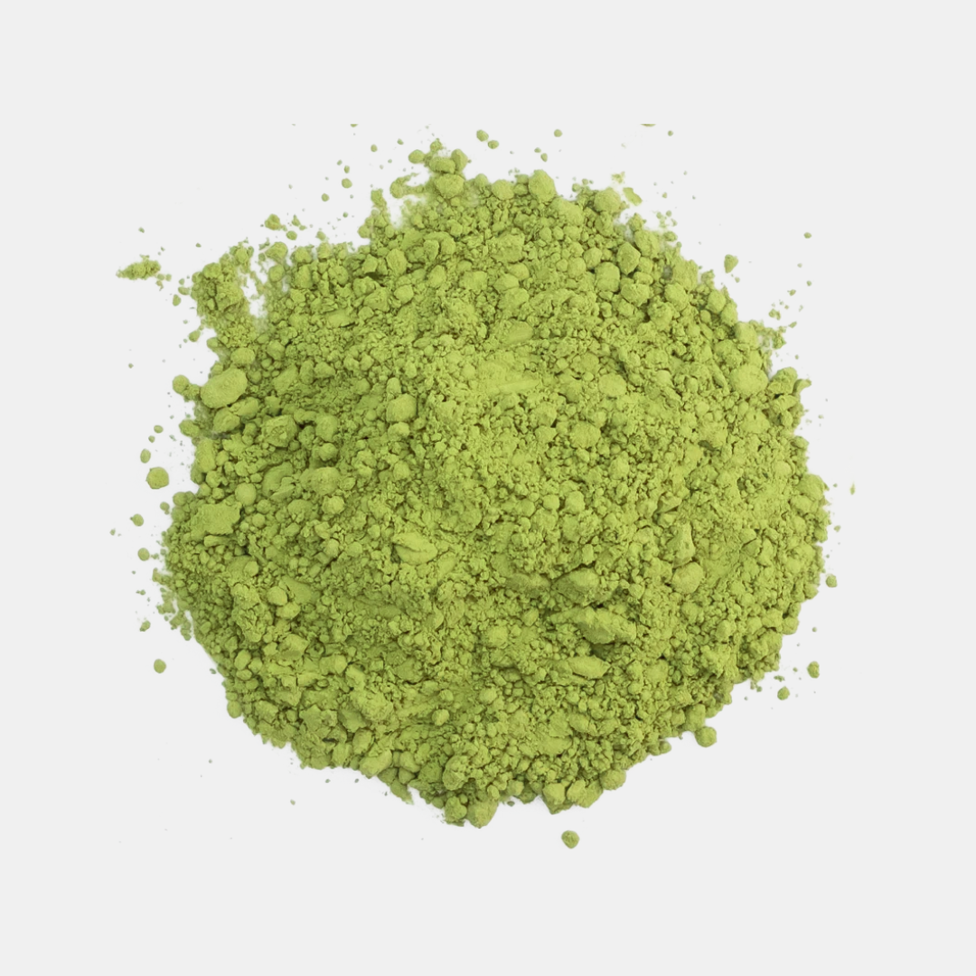 A close-up of loose, vibrant green matcha powder