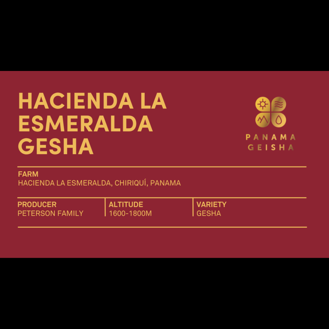 A deep red coffee label titled “Hacienda La Esmeralda Gesha,” listing farm, producer, altitude, and variety information. The gold Panama Gesha emblem is on the right.